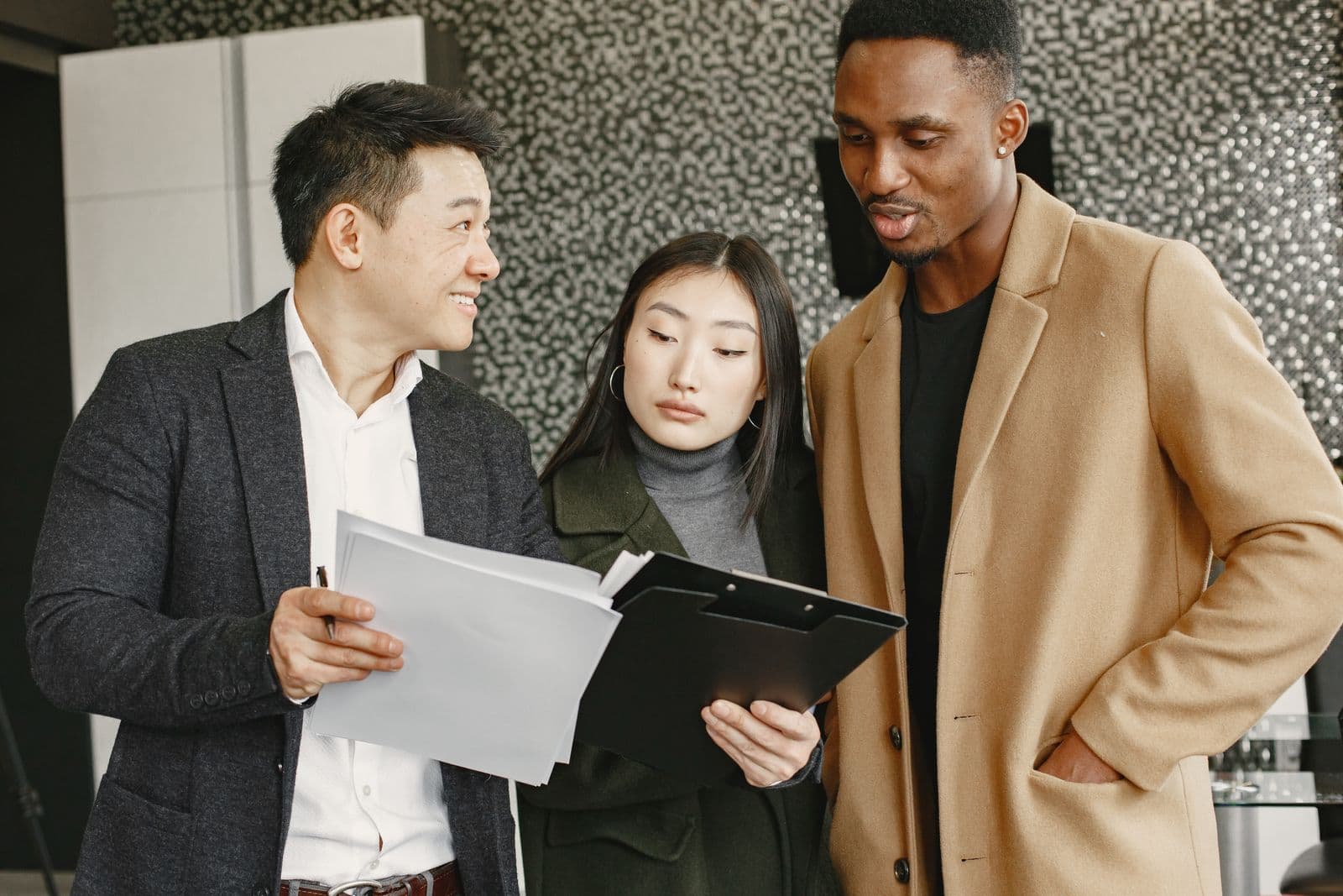 Attorney explaining a property contract to clients