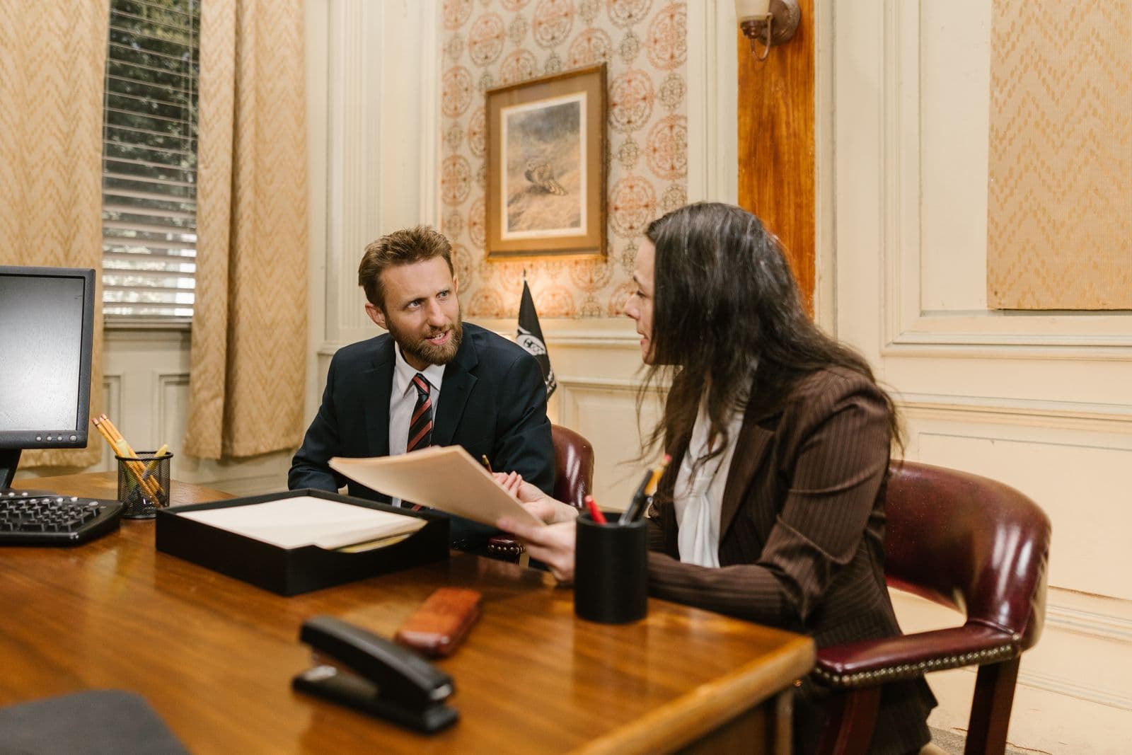 Attorneys reviewing documents during case preparation